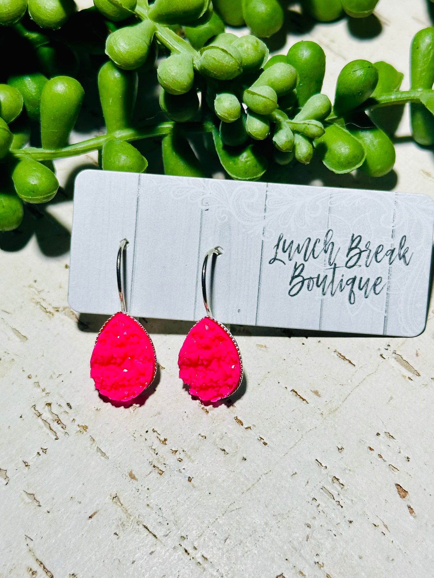 Small hot pink teardrop clasps