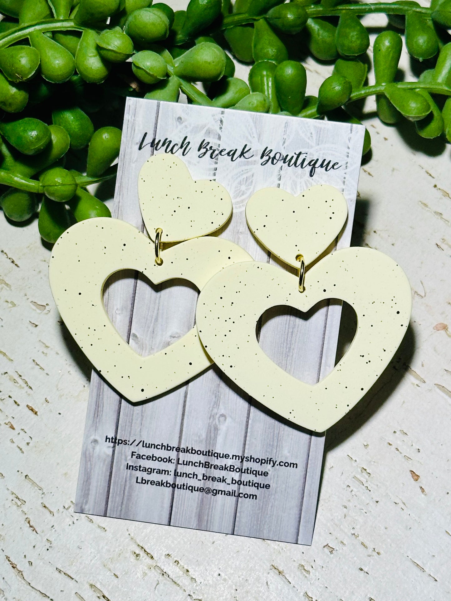 Double flicker heart studs